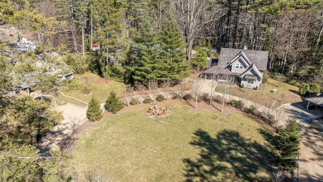 aerial view featuring a view of trees