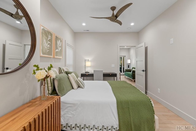 bedroom featuring light wood-type flooring and ceiling fan