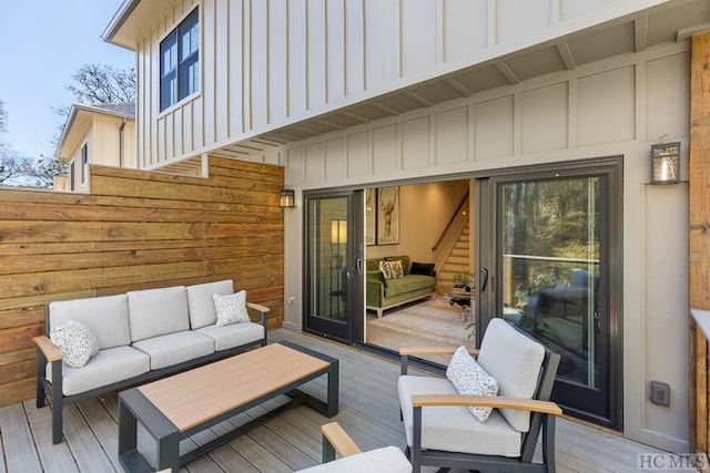 wooden deck featuring an outdoor hangout area