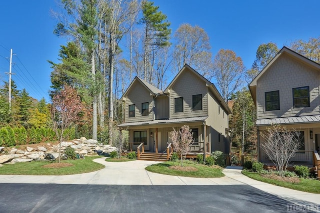 view of front of home featuring covered porch