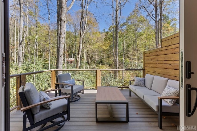 deck featuring outdoor lounge area