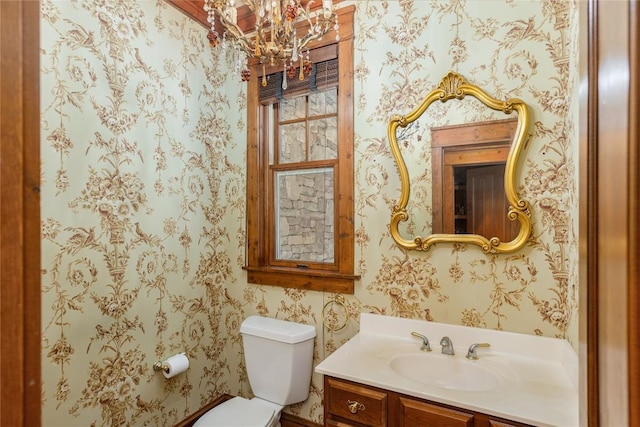 119 Old Still Rd, Sapphire, NC 28774 - bathroom featuring wallpapered walls, a chandelier, and vanity