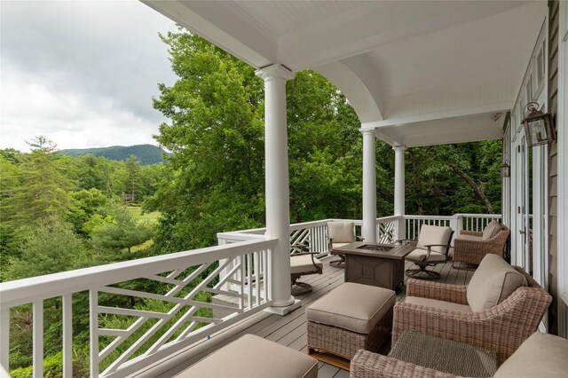 119 Old Still Rd, Sapphire, NC 28774 - wooden deck featuring a fire pit and a view of trees