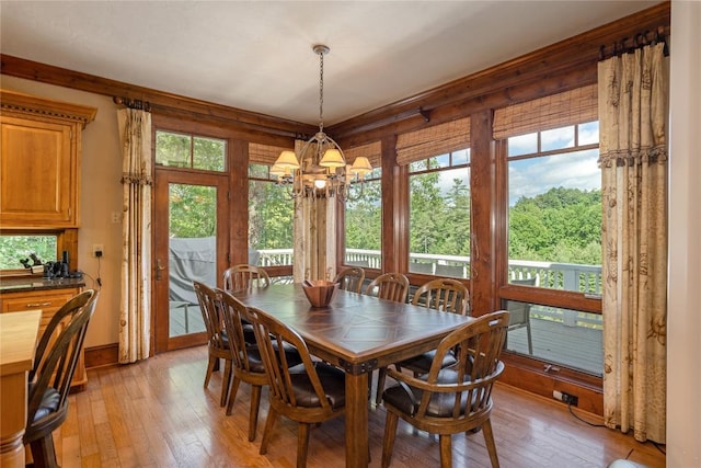 119 Old Still Rd, Sapphire, NC 28774 - dining room with a chandelier, light wood-style floors, and healthy amount of natural light
