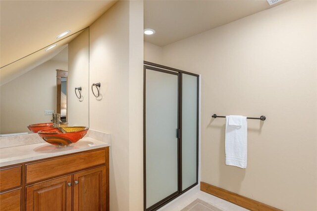 119 Old Still Rd, Sapphire, NC 28774 - full bathroom with a stall shower, vanity, recessed lighting, and vaulted ceiling