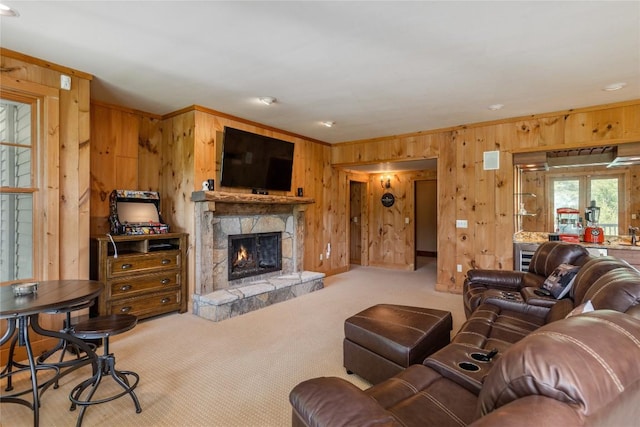 119 Old Still Rd, Sapphire, NC 28774 - living area featuring wood walls, ornamental molding, carpet floors, and a fireplace
