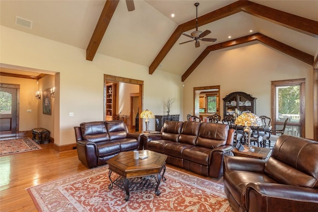 119 Old Still Rd, Sapphire, NC 28774 - living area featuring ceiling fan, wood finished floors, beam ceiling, recessed lighting, and high vaulted ceiling