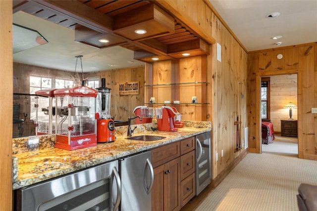 119 Old Still Rd, Sapphire, NC 28774 - kitchen featuring wood walls, wine cooler, fridge, light colored carpet, and light stone countertops