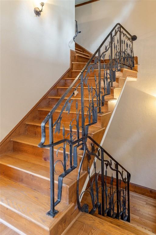 119 Old Still Rd, Sapphire, NC 28774 - stairs with wood finished floors and baseboards