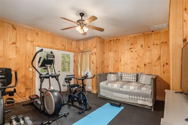 119 Old Still Rd, Sapphire, NC 28774 - workout area featuring ceiling fan, wooden walls, and carpet flooring