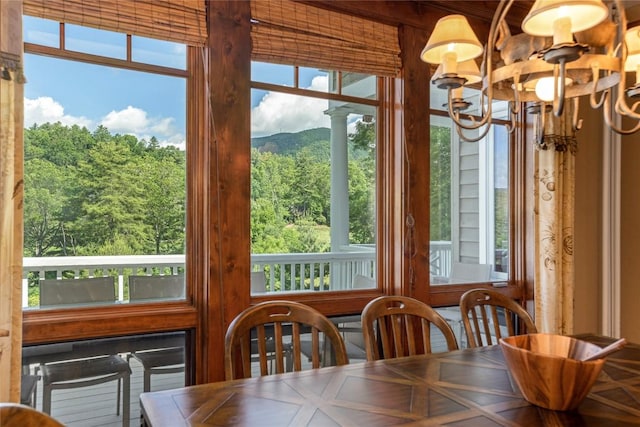 119 Old Still Rd, Sapphire, NC 28774 - dining room with a chandelier and a view of trees