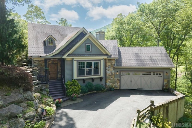 view of front of home featuring a garage