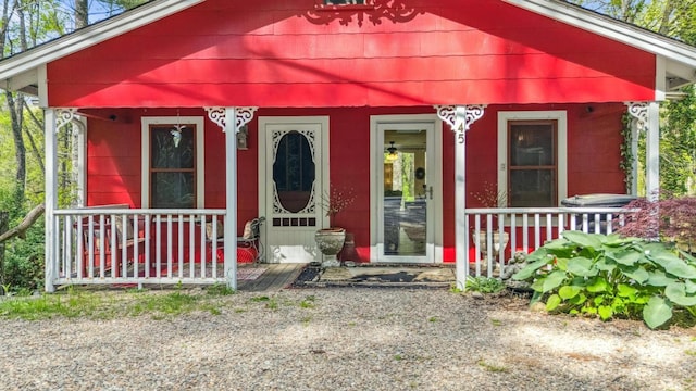 entrance to property featuring a porch
