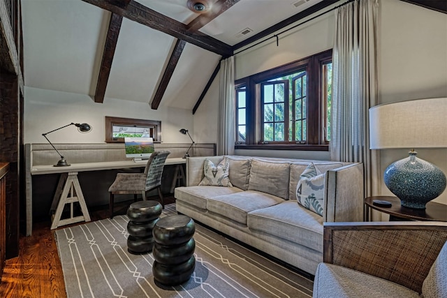 sitting room with visible vents, lofted ceiling with beams, and wood finished floors