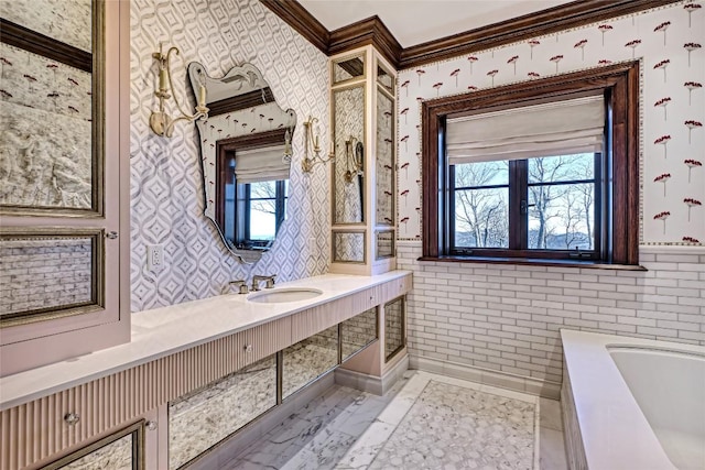 bathroom featuring crown molding, wallpapered walls, a wealth of natural light, and a bath