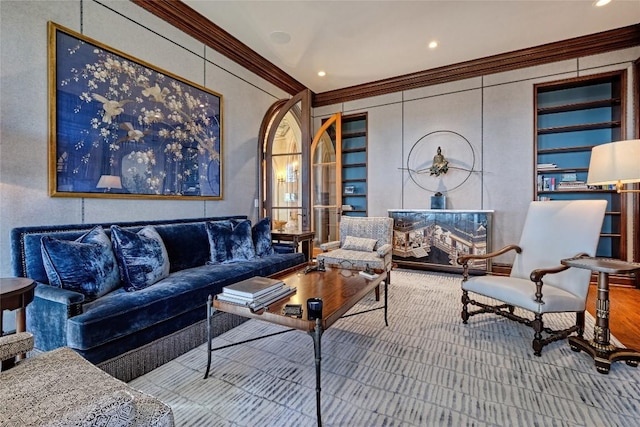 living room with recessed lighting, ornamental molding, and built in shelves