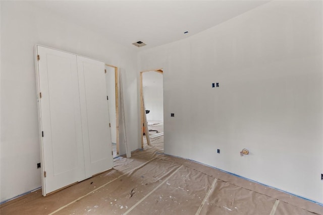 148 E Ridge Rd, Cashiers, NC 28717 - unfurnished bedroom featuring a closet