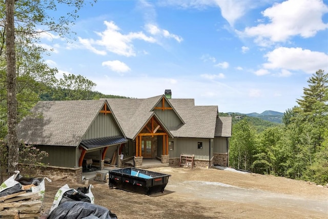 148 E Ridge Rd, Cashiers, NC 28717 - view of front of home with roof with shingles and board and batten siding