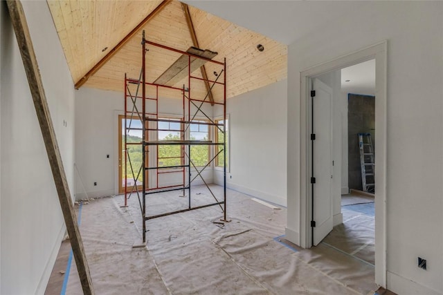 148 E Ridge Rd, Cashiers, NC 28717 - empty room with a towering ceiling, wood ceiling, and baseboards
