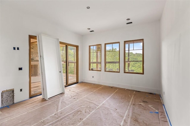 148 E Ridge Rd, Cashiers, NC 28717 - empty room featuring plenty of natural light