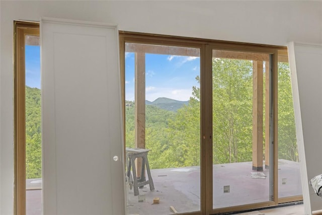 148 E Ridge Rd, Cashiers, NC 28717 - entryway with healthy amount of natural light and a mountain view