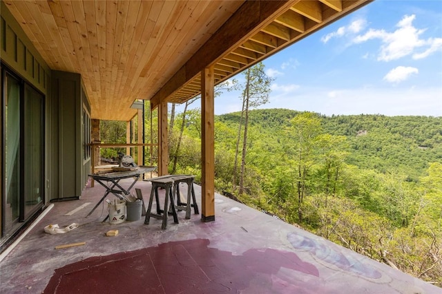 148 E Ridge Rd, Cashiers, NC 28717 - view of patio / terrace with a view of trees