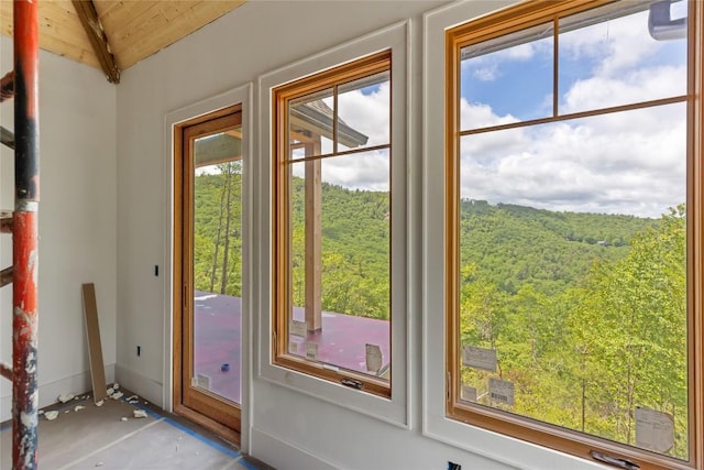 148 E Ridge Rd, Cashiers, NC 28717 - doorway to outside with wooden ceiling and a wooded view