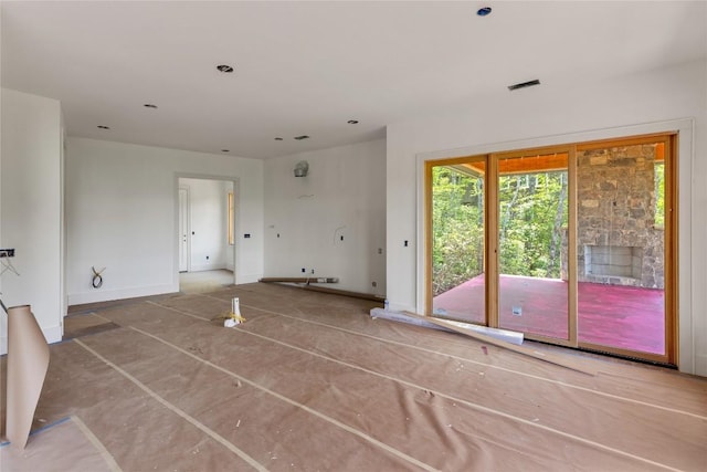 148 E Ridge Rd, Cashiers, NC 28717 - unfurnished living room featuring baseboards