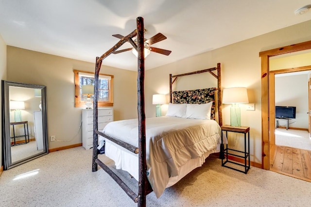 bedroom featuring ceiling fan and baseboards