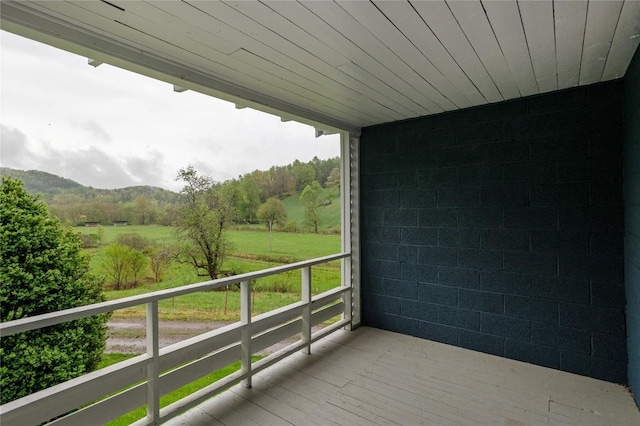 balcony featuring a mountain view