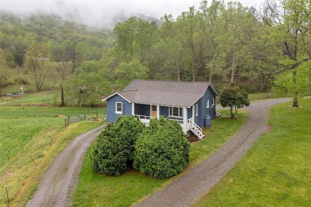 aerial view featuring a view of trees