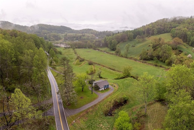 bird's eye view featuring a mountain view and a rural view