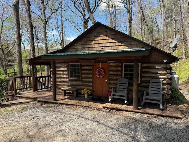 00 Gibson Cove Rd, Franklin, NC 28734 - log-style house featuring log exterior, metal roof, a deck, and an outdoor structure