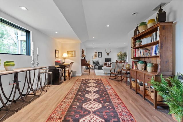 1240 King Gap Rd, Highlands, NC 28741 - living area featuring wood finished floors, recessed lighting, and an upstairs landing