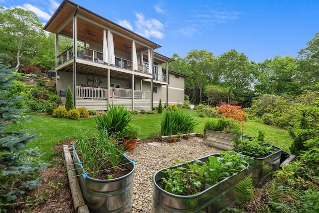 1240 King Gap Rd, Highlands, NC 28741 - back of house featuring a balcony, a garden, a yard, and ceiling fan