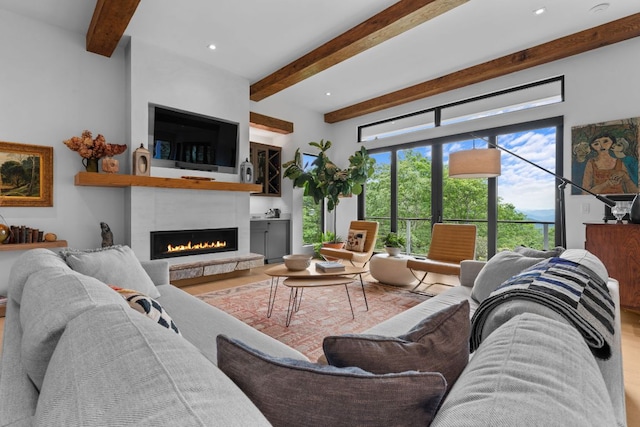 1240 King Gap Rd, Highlands, NC 28741 - living area with beam ceiling and a warm lit fireplace
