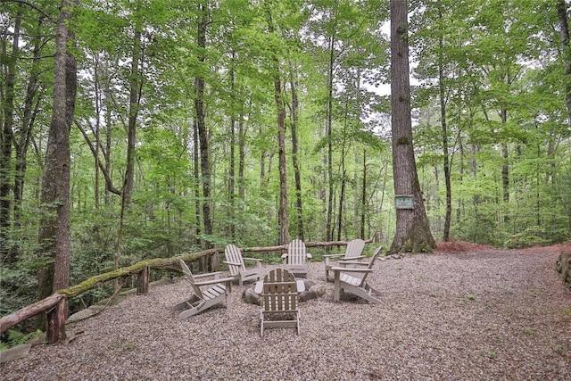 151 Rhododendron Ct, Sapphire, NC 28774 - view of yard with a fire pit and a forest view