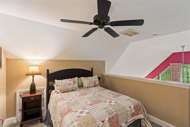 151 Rhododendron Ct, Sapphire, NC 28774 - bedroom featuring lofted ceiling, carpet floors, and a ceiling fan