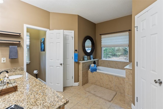 151 Rhododendron Ct, Sapphire, NC 28774 - full bathroom featuring a garden tub, tile patterned flooring, and vanity