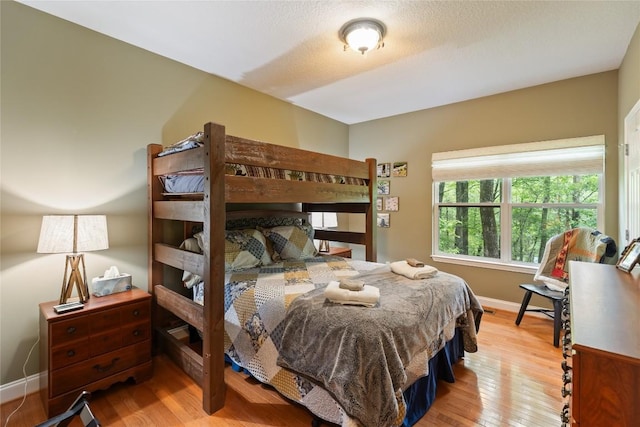 151 Rhododendron Ct, Sapphire, NC 28774 - bedroom featuring wood finished floors