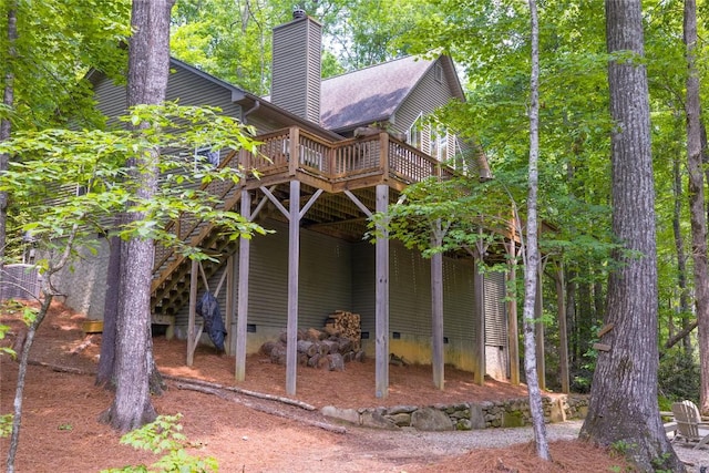 151 Rhododendron Ct, Sapphire, NC 28774 - rear view of house with crawl space, a wooden deck, and a chimney