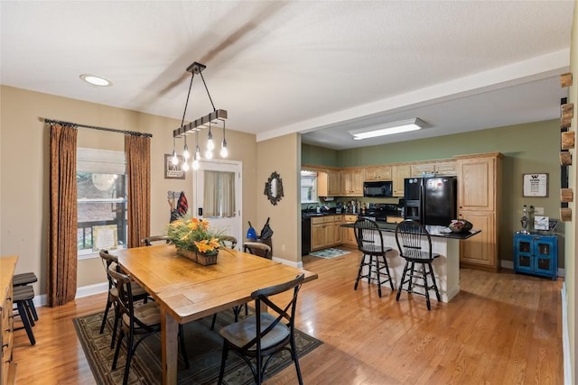 151 Rhododendron Ct, Sapphire, NC 28774 - dining area featuring light wood finished floors