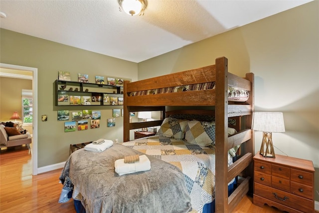 151 Rhododendron Ct, Sapphire, NC 28774 - bedroom with wood finished floors and baseboards