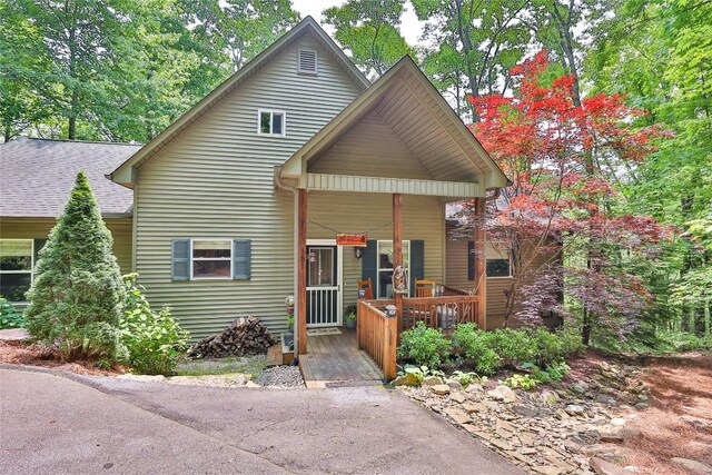 151 Rhododendron Ct, Sapphire, NC 28774 - view of front facade featuring covered porch