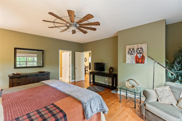 151 Rhododendron Ct, Sapphire, NC 28774 - bedroom with light wood-type flooring and ceiling fan