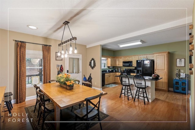 151 Rhododendron Ct, Sapphire, NC 28774 - dining space with light wood-style flooring