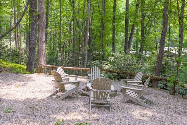 151 Rhododendron Ct, Sapphire, NC 28774 - view of yard with a fire pit and a view of trees