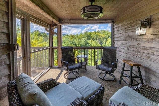 sunroom / solarium with a wealth of natural light