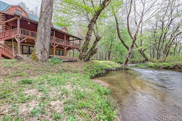 view of yard with a water view