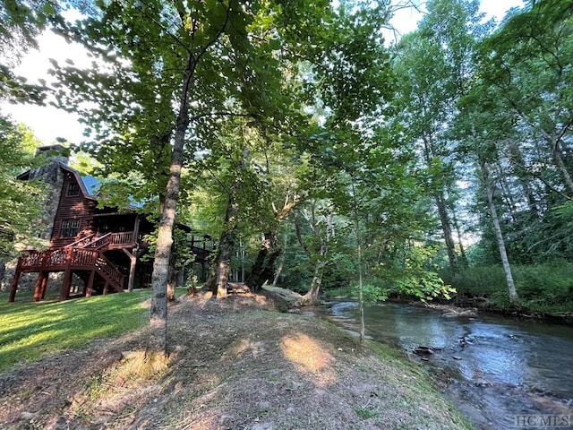 view of yard with a deck